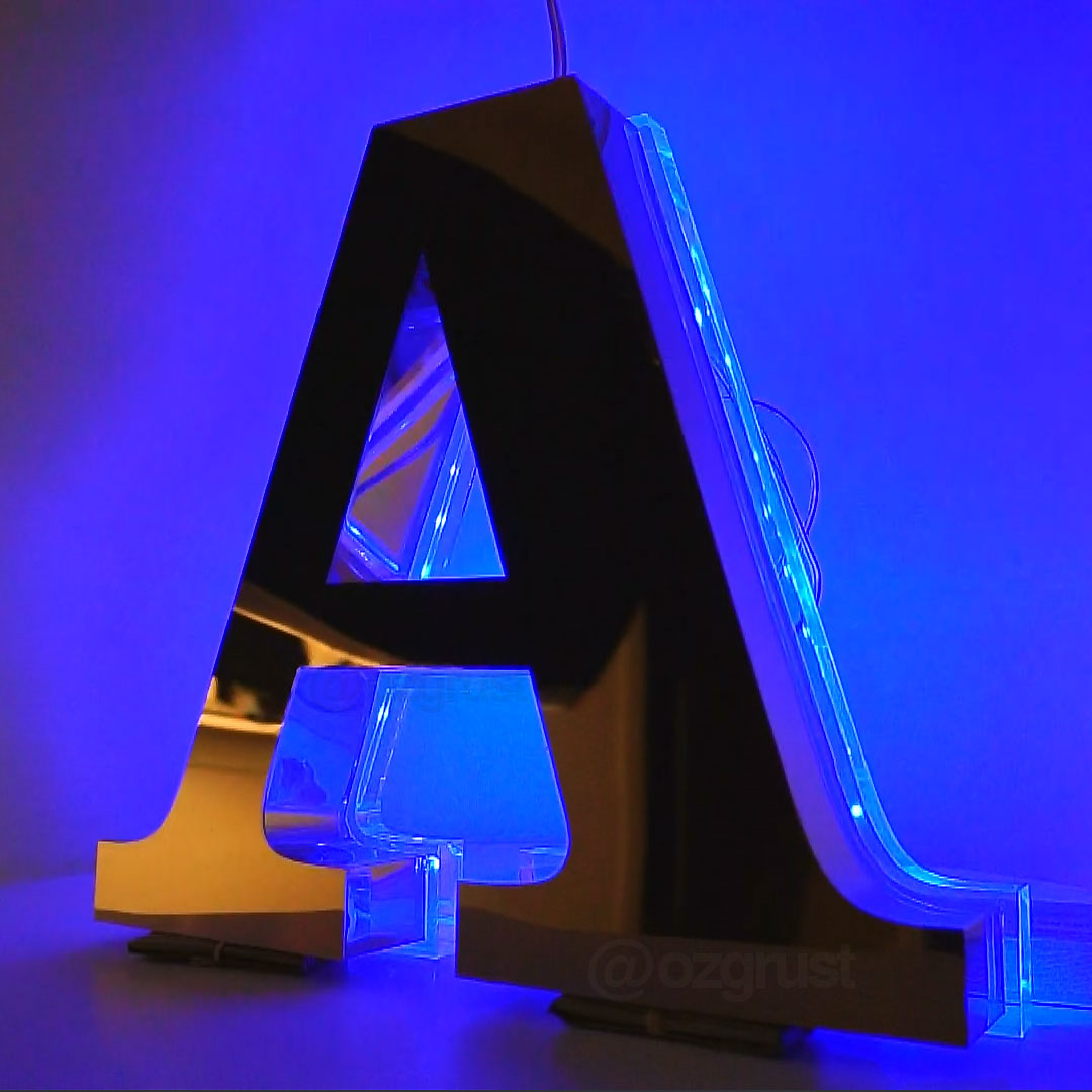 model-5-v4-endirekt-paslanmaz-zemine-10mm-pleksi-kutu-harf4